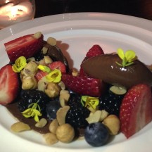 A mixture of berries, peanuts and dark chocolate