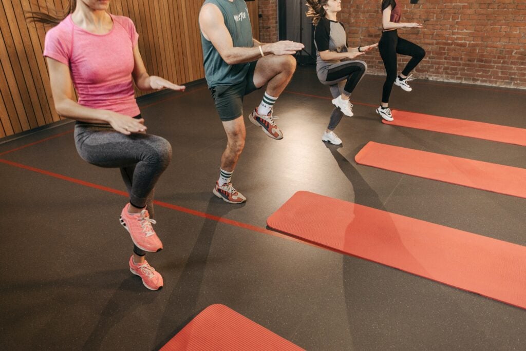 people in a HIIT workout class