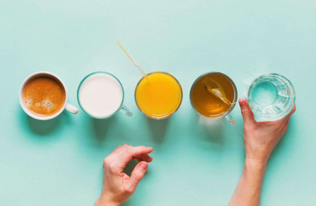 a variety of beverages lined up