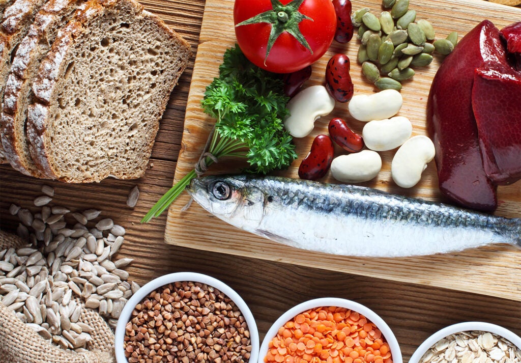 a variety of copper-rich foods including nuts, seeds, beans, fish, whole grains, and organ meat